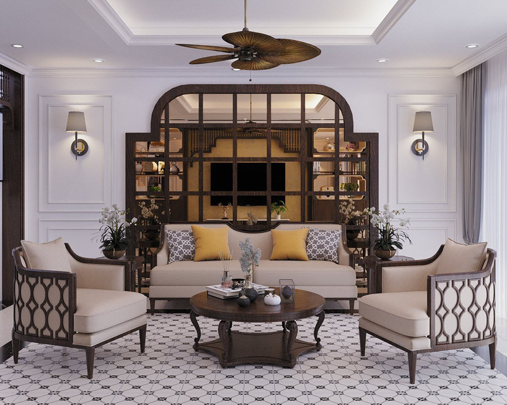 Phòng khách toát lên vẻ sang trọng, tinh tế với điểm nhấn ấn tượng là khung gương chiếm phần lớn diện tích tường phía sau ghế sofa, tạo ảo giác không gian như thoáng rộng hơn.